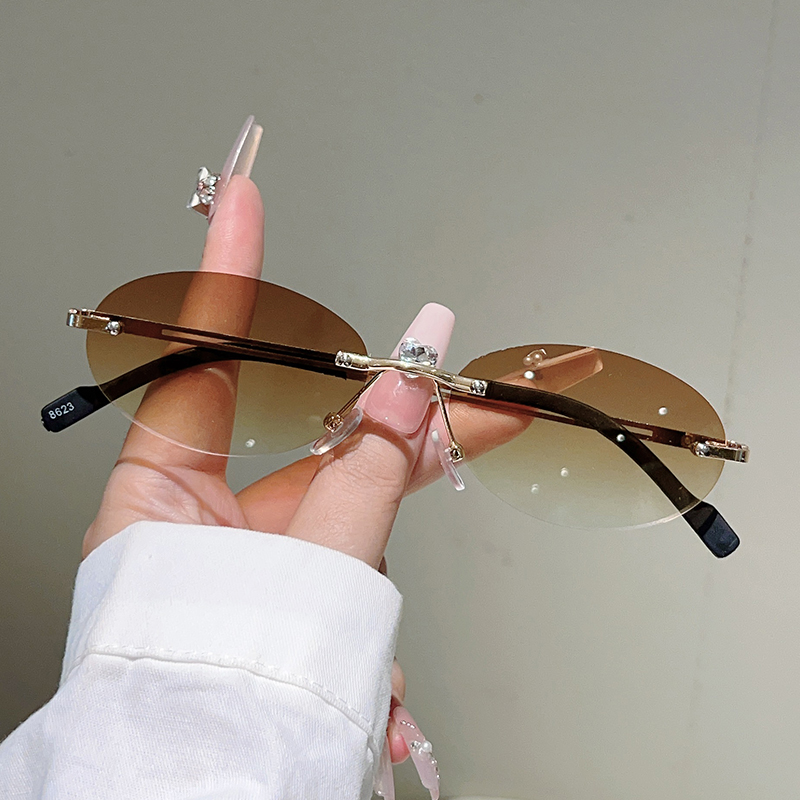 Gafas de sol ovaladas sin mont - Designer Sunglasses reseña y precio